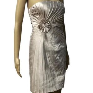 Champagne color dress by Minuet, size S. Fun 3D flower detail on center side